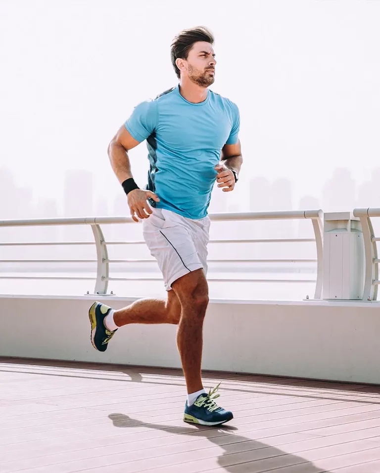 man running blue shirt